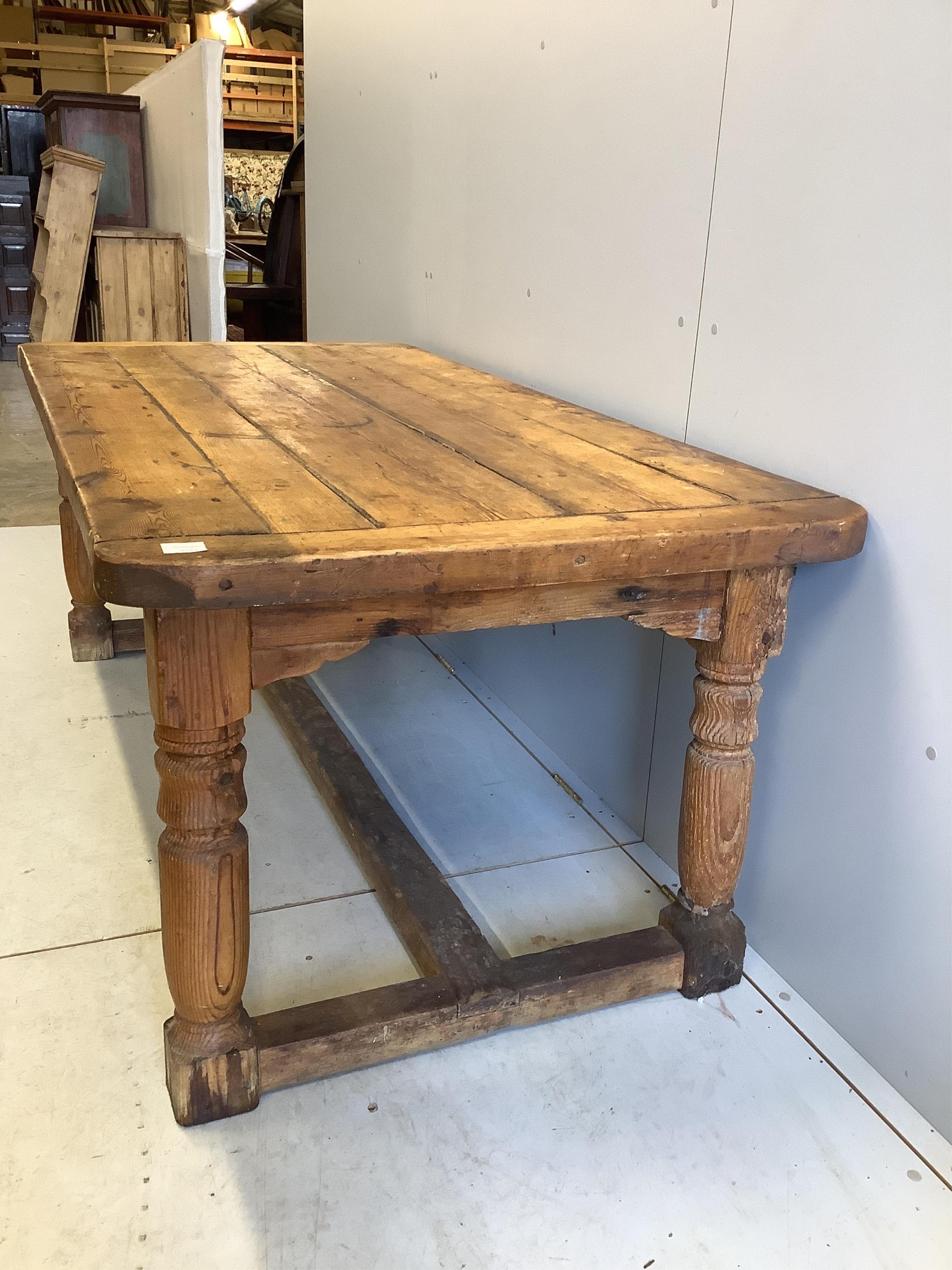 An 18th century style rectangular pine refectory table, width 180cm, depth 90cm, height 72cm. Condition - fair